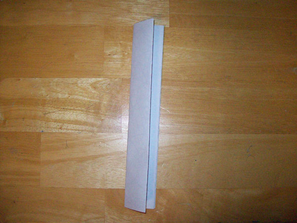 The same sheet of paper folded in half three times.